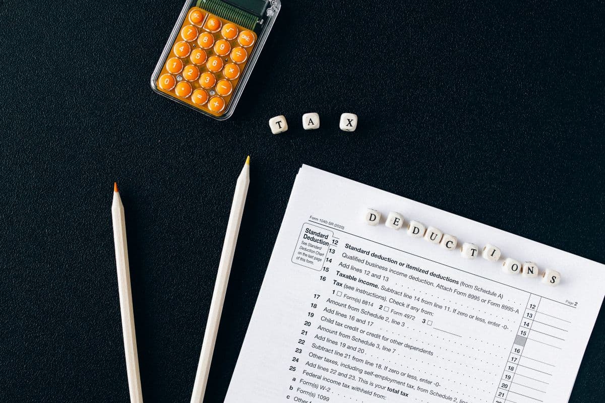 A tax return form being filled out